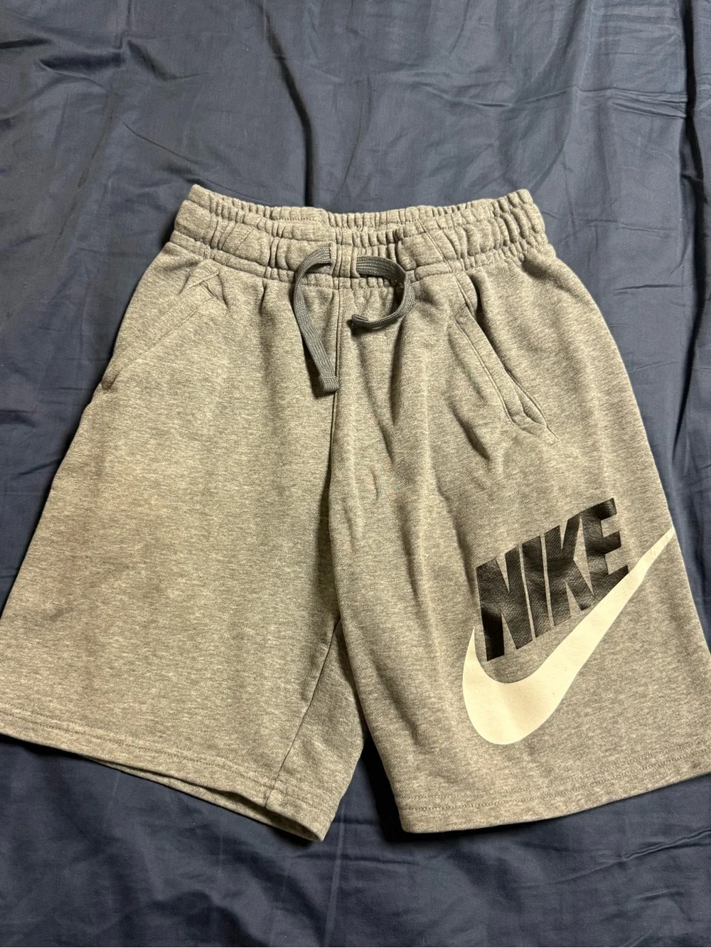 Nike Gray Athletic Logo Shorts with White Swoosh